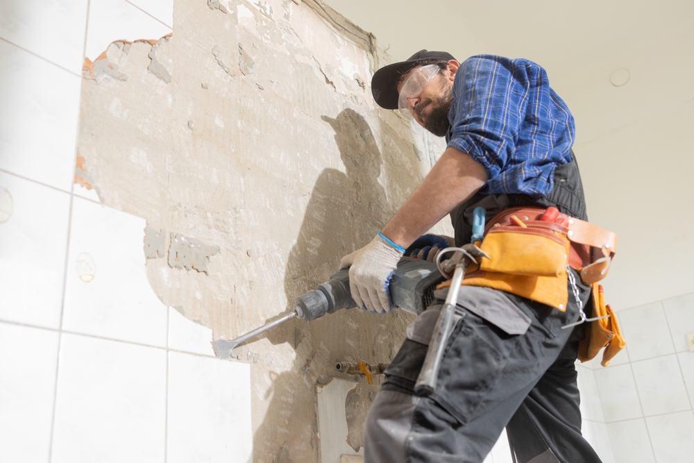 A,Man,In,Work,Clothes,Wearing,A,Shirt,And,With